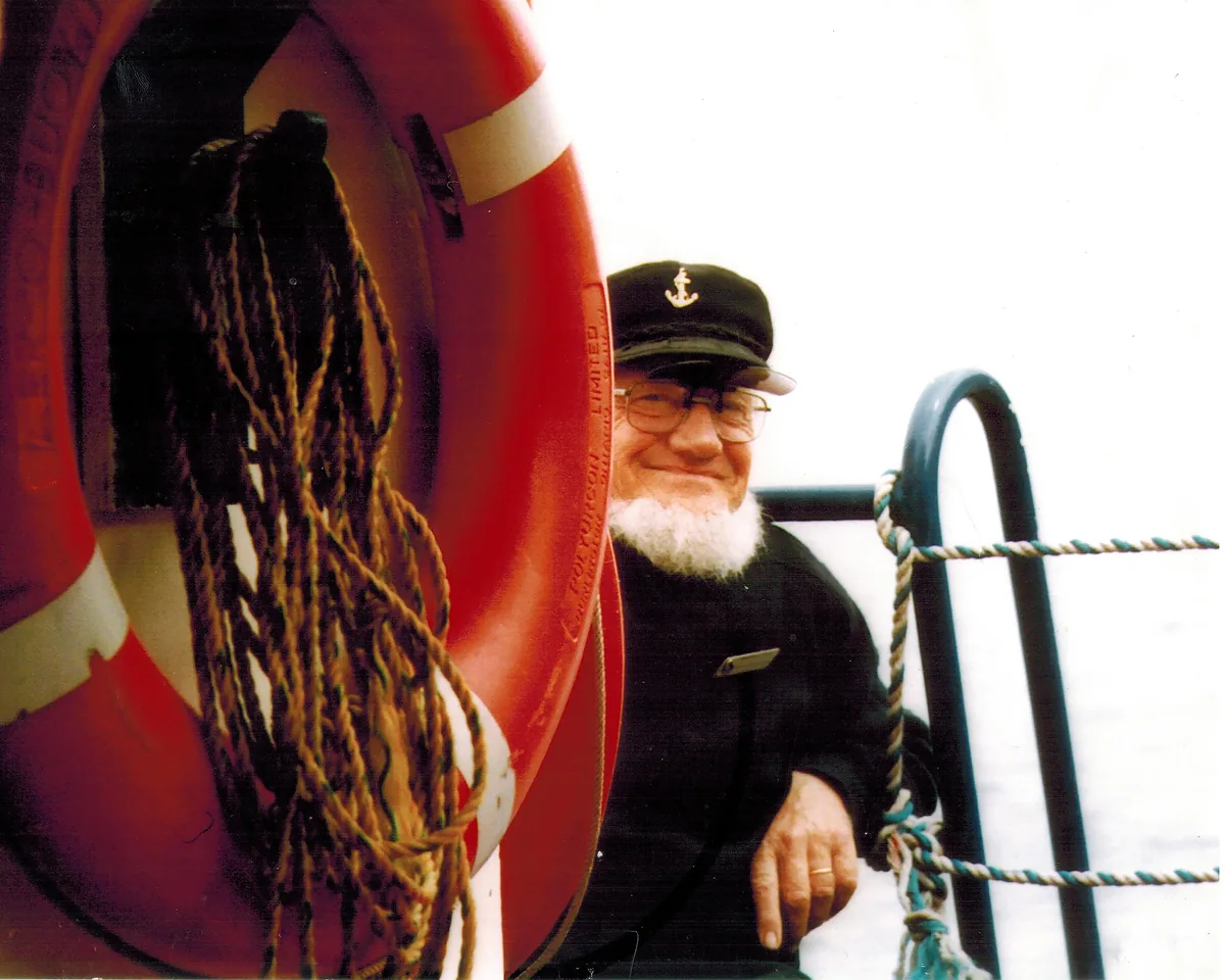 Captain Joe sitting at the back of the Eastwind III in 2003